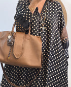 Robe noire pois