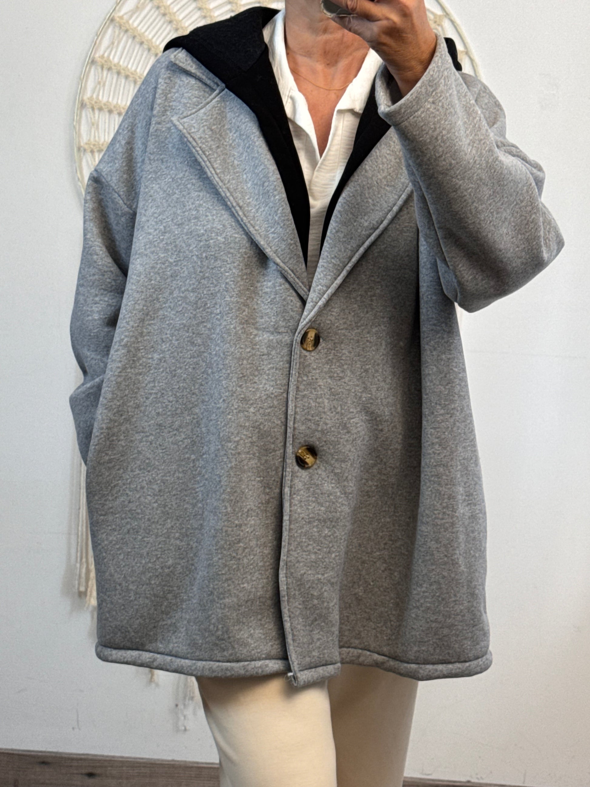 Veste molletonnée grise capuche noire TU 44/50