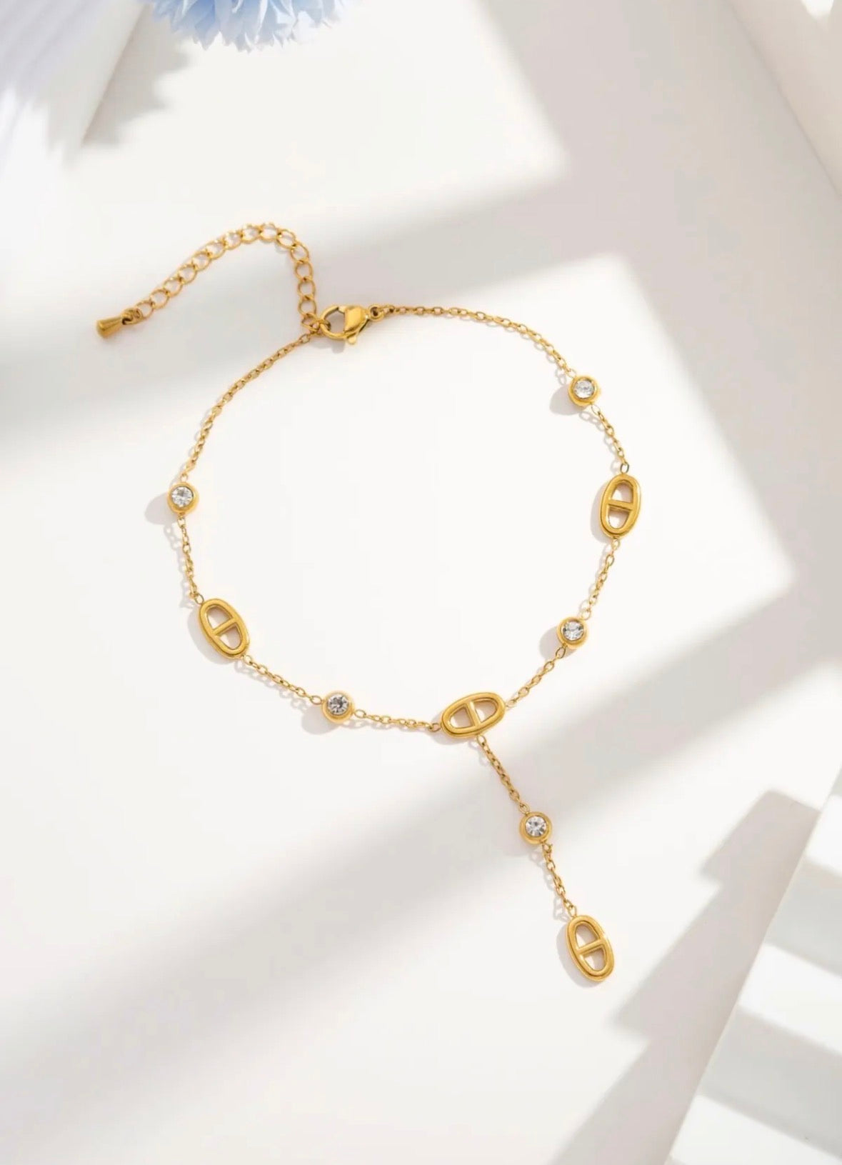 Chaîne cheville dorée pendante strass ovale
