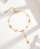 Chaîne cheville dorée pendante strass ovale