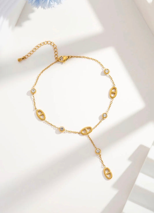 Chaîne cheville dorée pendante strass ovale
