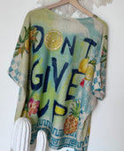 Haut oversize Don’t give up