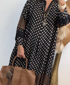 Robe noire pois