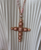 Pendentif croix rose pâle
