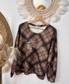 Pull à carreaux J’adore