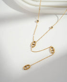 Collier Doré Motif
Ovale Pierres