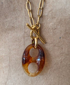 Collier avec pendentif résine