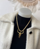 Collier cordelette dorée tête de buffle