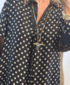 Robe noire pois