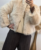 Blouson fausse fourrure beige