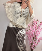 Pull ajouré crème