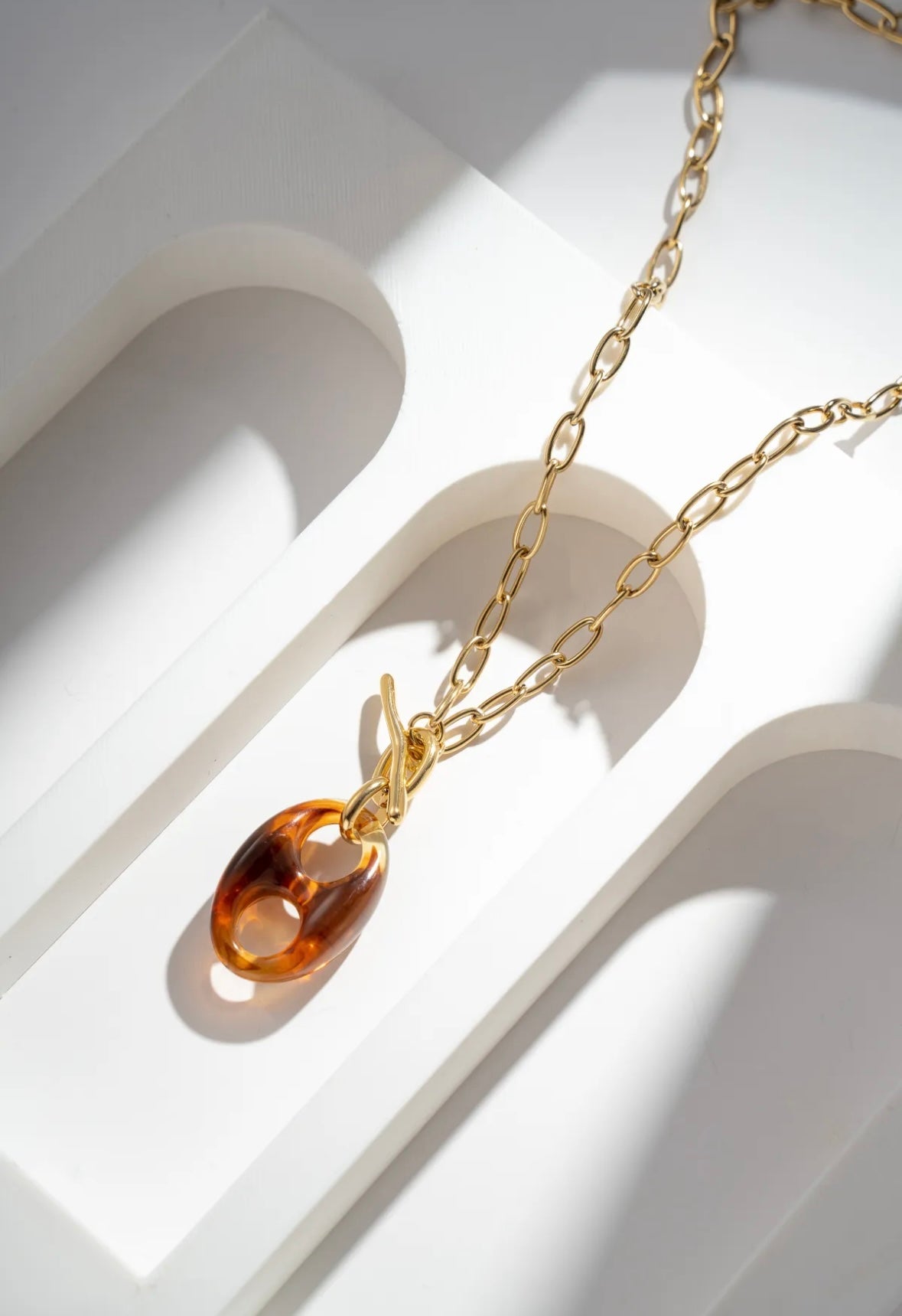 Collier avec pendentif résine