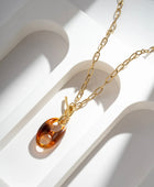 Collier avec pendentif résine