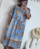 Robe fluide arabesque bleu ciel TU 40/48