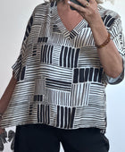 Blouse fluide imprimée noire TU 38/48