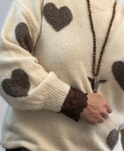 Pull crème cœurs marron