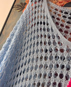 Pull crochet bleu ciel
