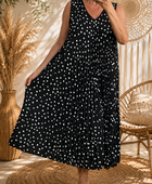 Robe plissée noire à pois